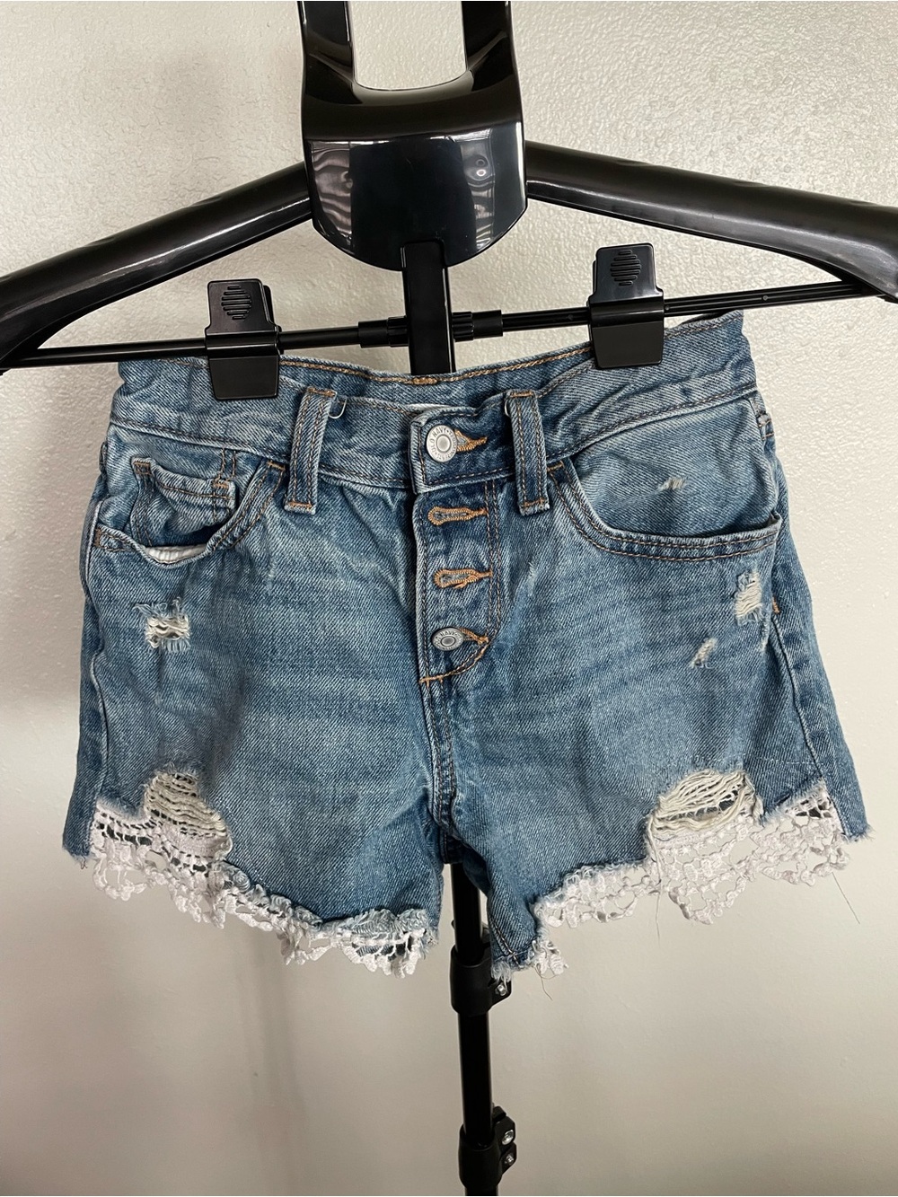 Light Blue Distressed Denim Shorts with White Lace Hem